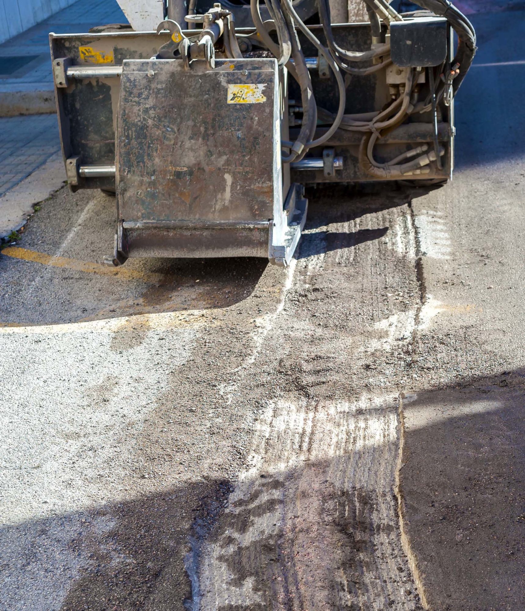 worker driver Skid steer remove Worn Asphalt - Blacklidge